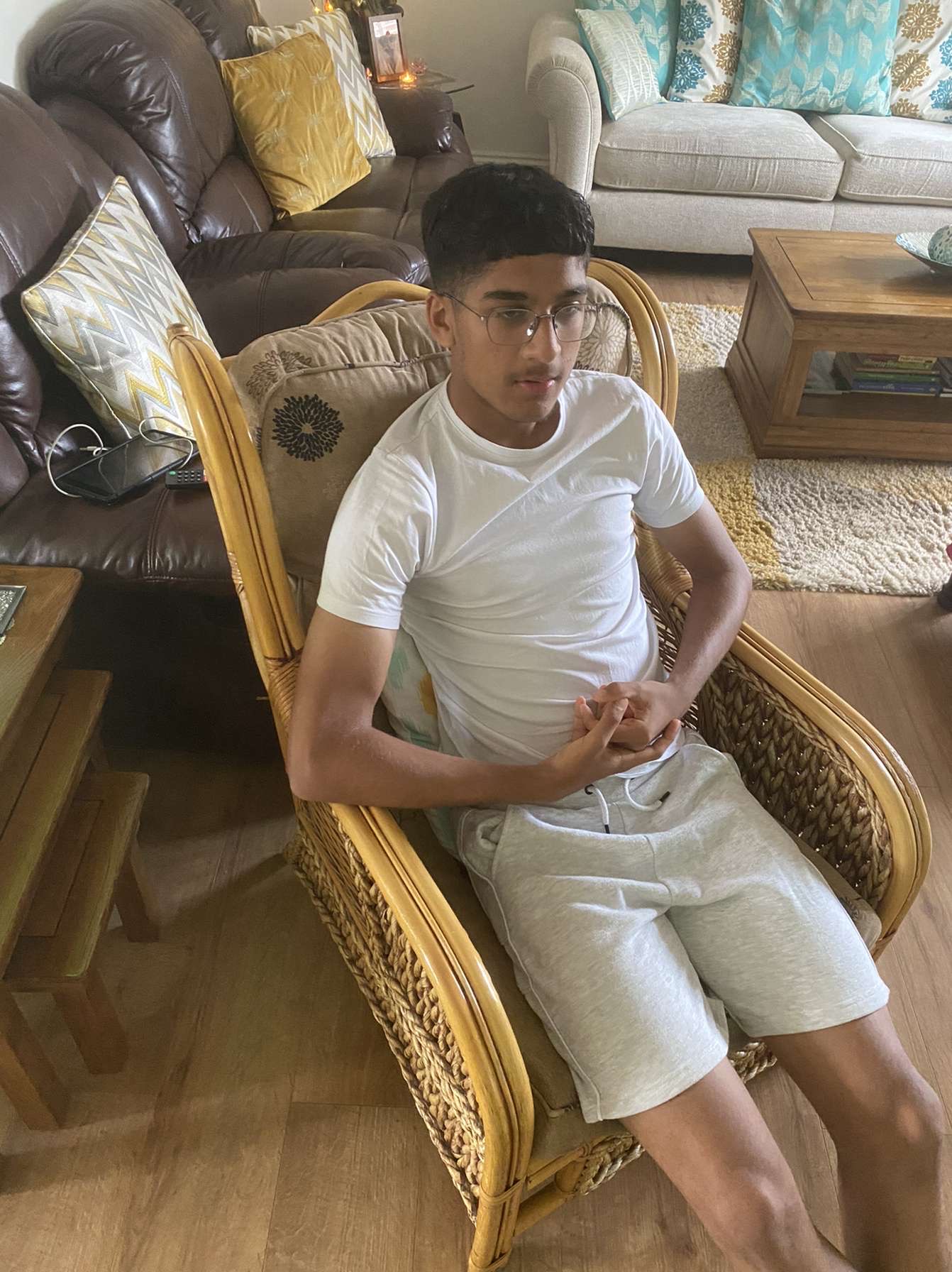 An earlier photograph of Haridev sitting at home